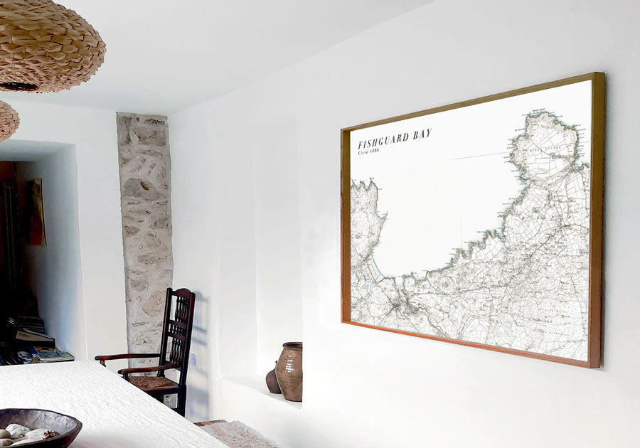 A fishguard Bay map, shown here framed on a lime washed wall