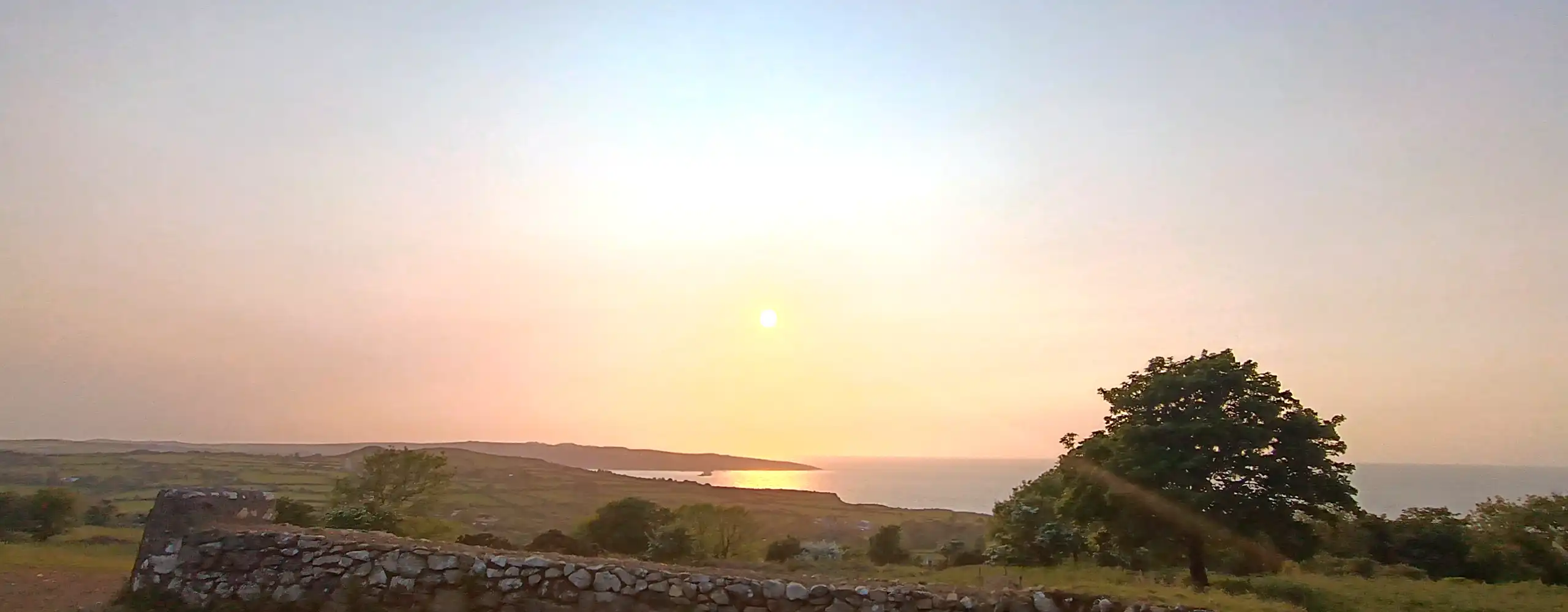 Sunset over Fishguard Harbour from the patio