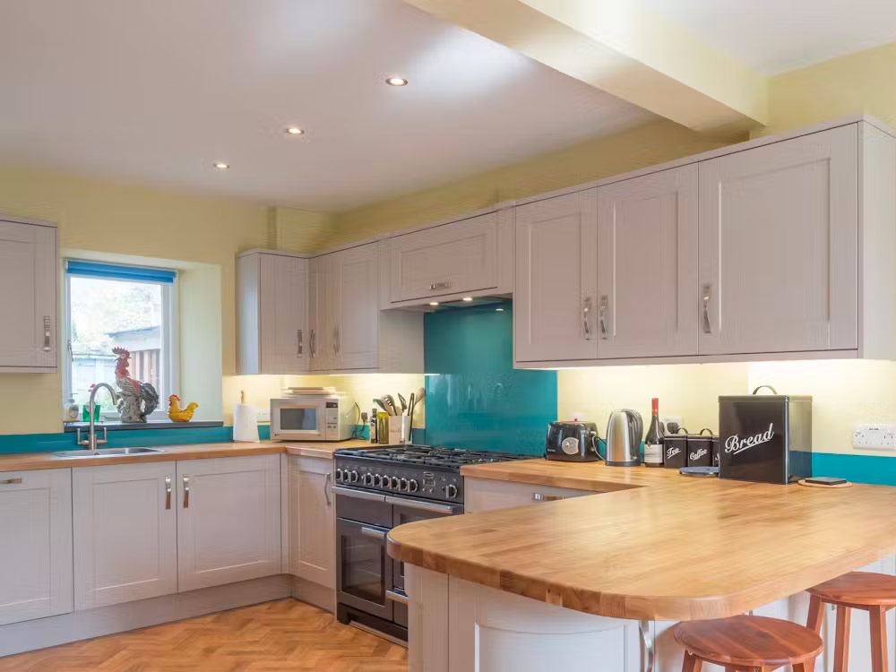 Kitchen / dining area with breakfast bar Kitchen / dining area with breakfast bar